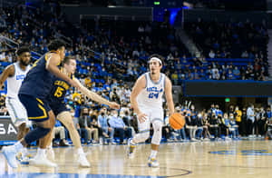 U C L A Basketball Game Action Wallpaper