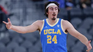 U C L A Basketball Player Gesture Wallpaper