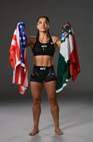 U F C Fighter Dual Flags Pose Wallpaper