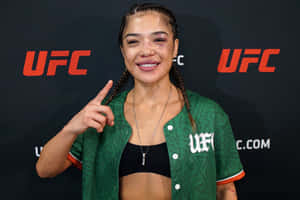 U F C Fighter Smiling With Bruised Eye Wallpaper