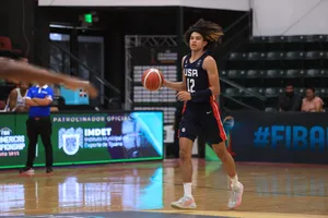 U S A Basketball Player Dribbling Action Wallpaper