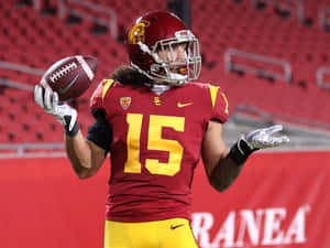 U S C Football Player Catching Ball Wallpaper