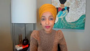 U.s. Representative Ilhan Omar During An Online Meeting Wallpaper