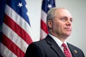 U.s. Representative Steve Scalise With American Flags In The Background Wallpaper