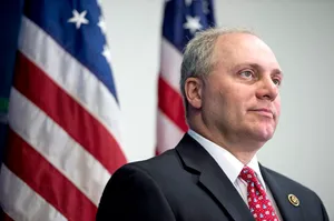 U.s. Representative Steve Scalise With American Flags In The Background Wallpaper