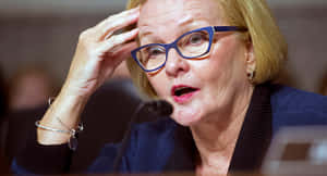 U.s. Senator Claire Mccaskill With Blue Glasses Wallpaper