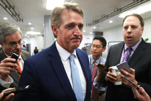 U.s. Senator Jeff Flake Engaging With The Press Wallpaper