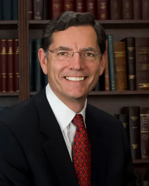 U.s. Senator John Barrasso Giving A Heartfelt Smile Wallpaper