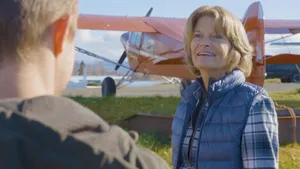 U.s. Senator Lisa Murkowski Embarking On A Private Plane Wallpaper