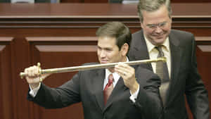 U.s. Senator Marco Rubio Smiling During An Event Wallpaper