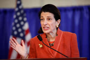 U.s. Senator Olympia Snowe Elegantly Dressed In Red Wallpaper