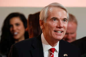 U.s. Senator Rob Portman Smiling During A Discussion Wallpaper