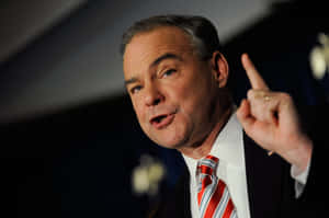 U.s. Senator Tim Kaine Delivering Speech With Raised Finger Wallpaper