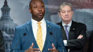 U.s Senator Tim Scott Wearing A Yellow Necktie Wallpaper