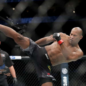 Ufc Fighter Ronaldo Souza High Kick Wallpaper