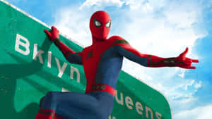 Ultimate Spider-man Swinging Through The City Wallpaper