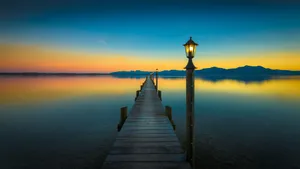 Ultra Hd Pier During Sunset Laptop Wallpaper