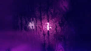 Ultraviolet Lights Against A Moist Glass Wallpaper