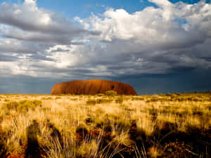 Uluru Cloudy Sky Wallpaper