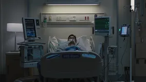 Unconscious Patient On Hospital Bed Wallpaper