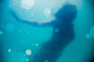 Underwater_ Mermaid_ Silhouette Wallpaper