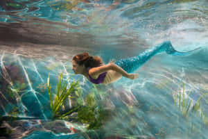 Underwater_ Mermaid_ Swimming.jpg Wallpaper