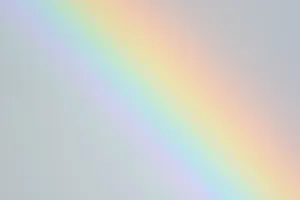 Unearth The Beauty Of Nature With This Vibrant Pastel Rainbow Iphone Wallpaper Wallpaper