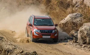 Unleash The Beast - Majestic Mahindra Xuv500 On The Move Wallpaper