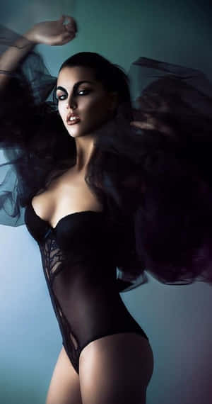 Unleash Your Inner Dark Sorceress Wallpaper