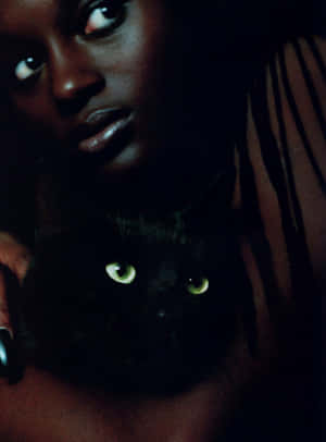 Unleash Your Inner Power With Black Magic Woman. Wallpaper