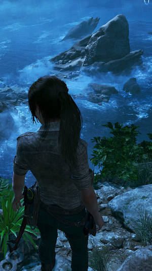 Unlock The Secrets And Adventures Of Lara Croft With Your Iphone. Wallpaper