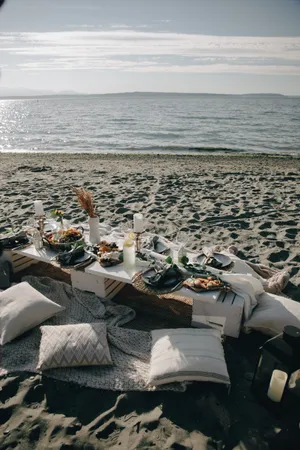 Unwind At The Perfect Beach Picnic Wallpaper