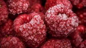 Up-close View Of Fresh, Ripe Red Berries Wallpaper