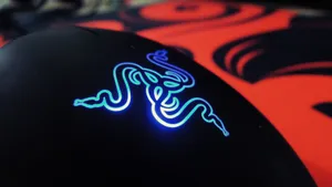 Upgrade To The Future Of Gaming: A High-performance, Precision Gaming Mouse Wallpaper