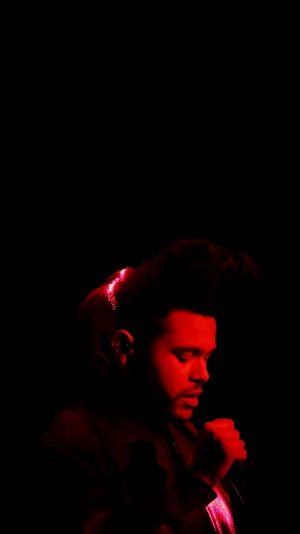 Upgrade Your Experience With An Iphone And Listen To The Weeknd. Wallpaper