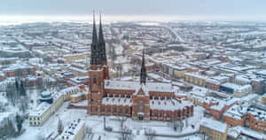 Uppsala Cathedral Winter Aerial View Wallpaper