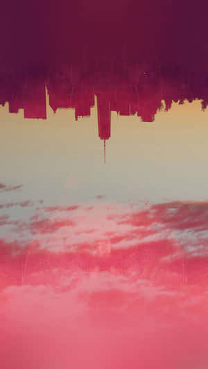 Upside Down Cityscape In Pink Hues Wallpaper