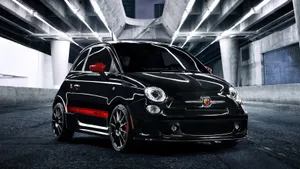Urban Adventure With A Stylish Fiat 500 Wallpaper