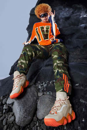 Urban_ Fashion_ Flair_ Orange_ Jersey_ Camo_ Pants Wallpaper