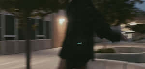 Urban Nocturne Blurry Figure.jpg Wallpaper