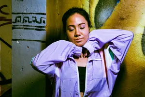 Urban Purple Jacket Portrait Wallpaper