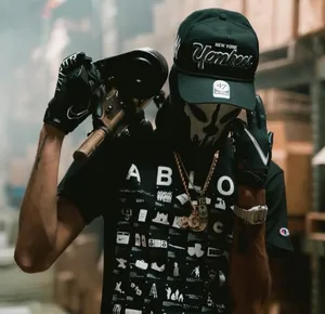 Urban_ Style_with_ Paintball_ Gun Wallpaper