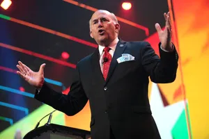 Us Representative Louie Gohmert Delivering Speech At A Public Event Wallpaper