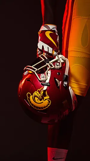 Usc Football Player Holding Helmet Wallpaper