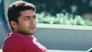 Vaaranam Aayiram Surya With Furrowed Brow Wallpaper