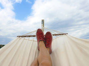 Vacation Lounging On Hammock Wallpaper