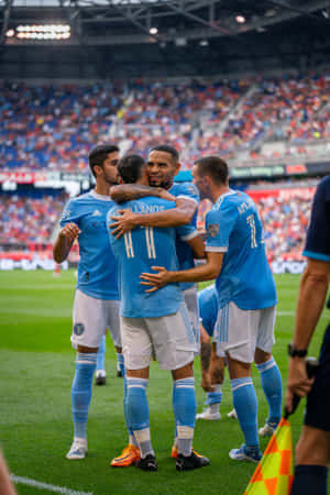 Valentin Castellanos Hugging Teammates New York City Fc Wallpaper