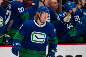 Vancouver Canucks Star Player Brock Boeser In Action Wallpaper