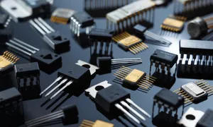 Various Electronic Components On Green Circuit Board Wallpaper