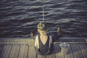 Various Fishing Bait And Tackle Displayed In A Natural Setting. Wallpaper